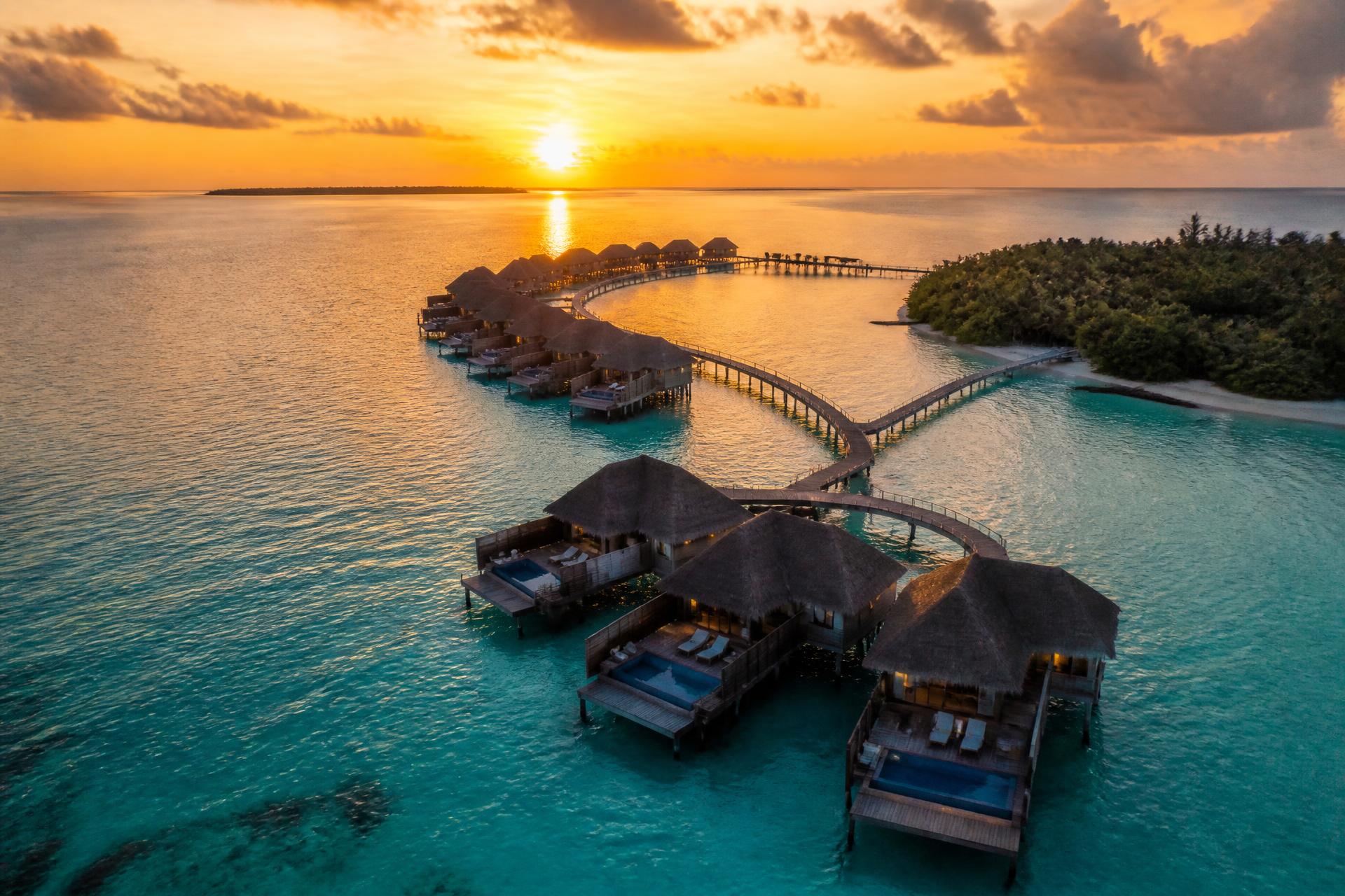 Kurumba House overwater villas at sunset